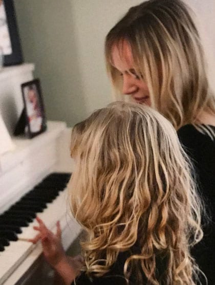 mother daughter at piano